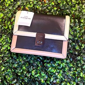 Mini Coach shoulder bag in black & tan/cream New.